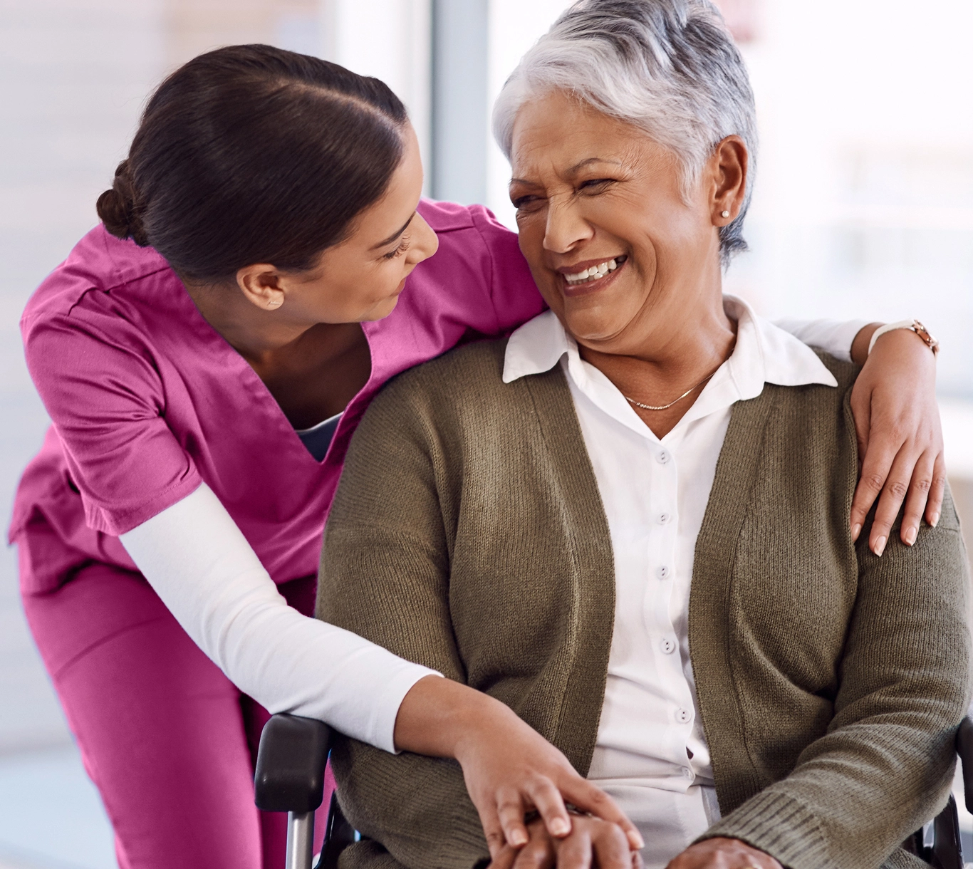 nurse hugging patient